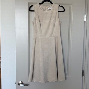 Sleeveless faux suede dress.